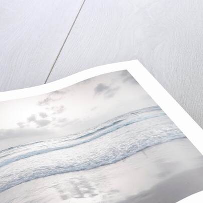 Tranquil beach with cloudscape by Assaf Frank